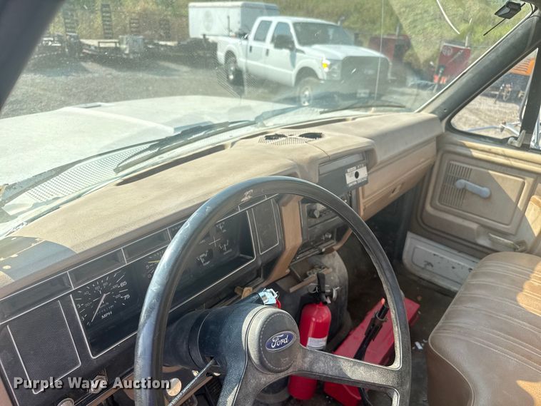 image for item EV1854 1990 Ford F700 crane truck