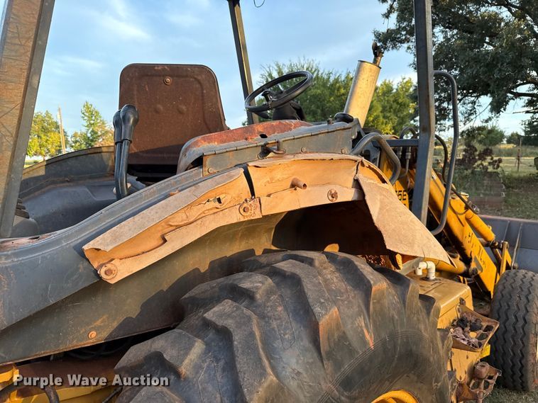 image for item GH9398 1998 New Holland 555E backhoe