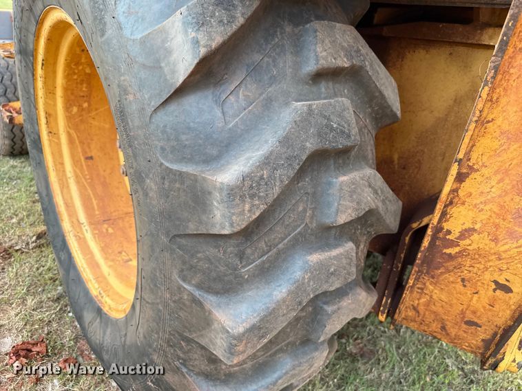 image for item GH9398 1998 New Holland 555E backhoe