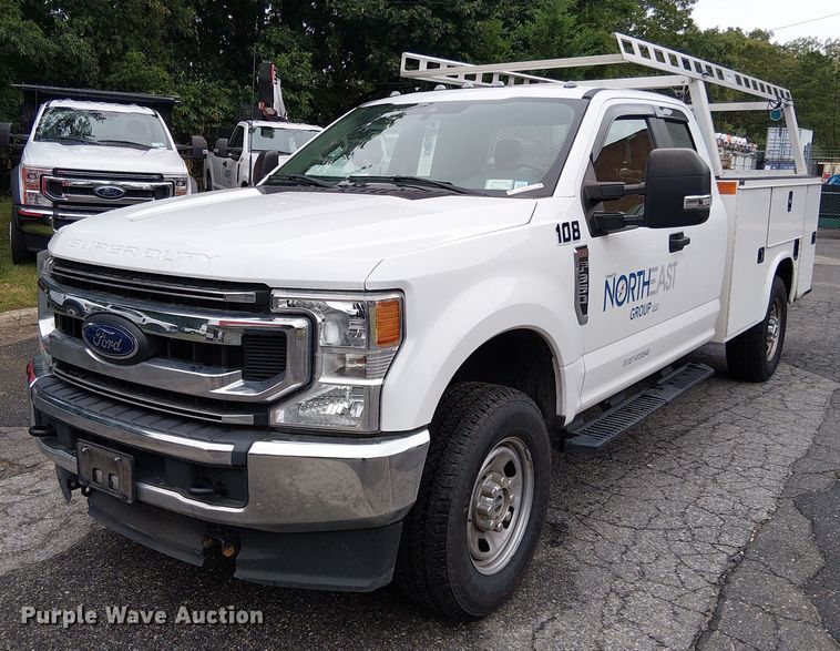 image for item EV5017 2022 Ford F350 Super Duty SuperCab utility bed pickup truck