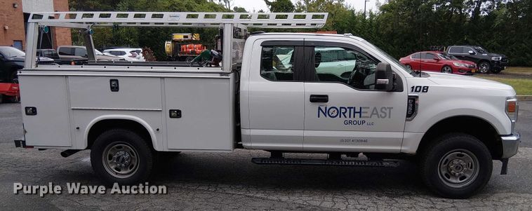 image for item EV5017 2022 Ford F350 Super Duty SuperCab utility bed pickup truck