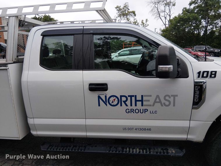 image for item EV5017 2022 Ford F350 Super Duty SuperCab utility bed pickup truck