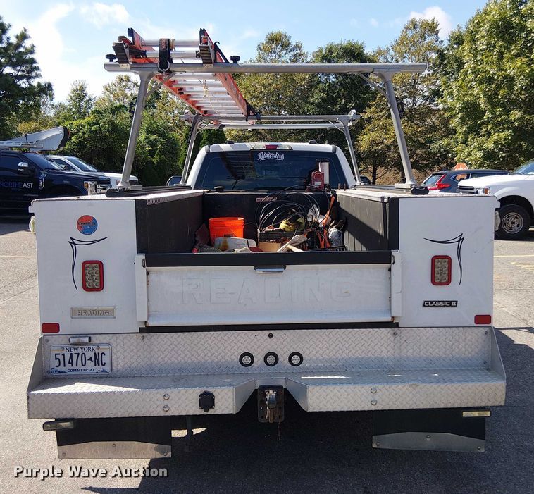 image for item EV5142 2021 Ford F350 Super Duty SuperCab utility bed pickup truck