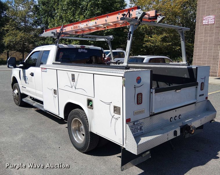 image for item EV5142 2021 Ford F350 Super Duty SuperCab utility bed pickup truck