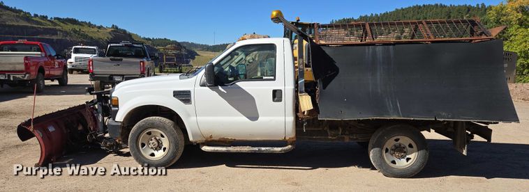 image for item DY1249 2009 Ford F350 Super Duty XL flatbed pickup truck