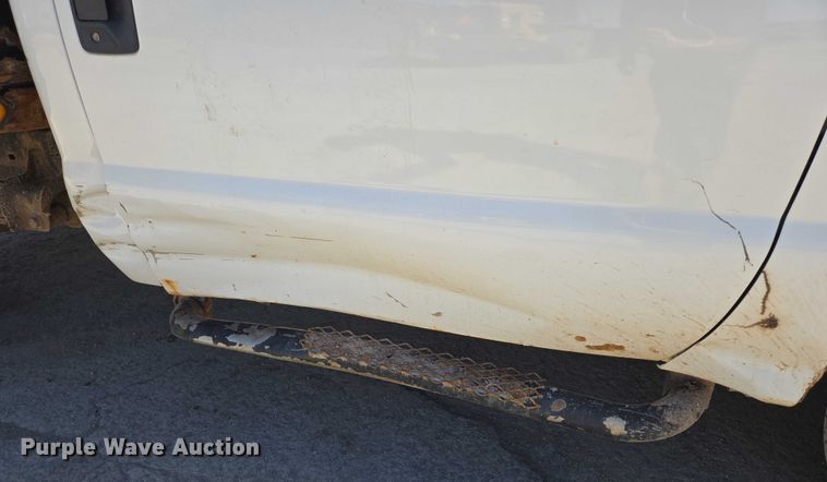 image for item DY1249 2009 Ford F350 Super Duty XL flatbed pickup truck