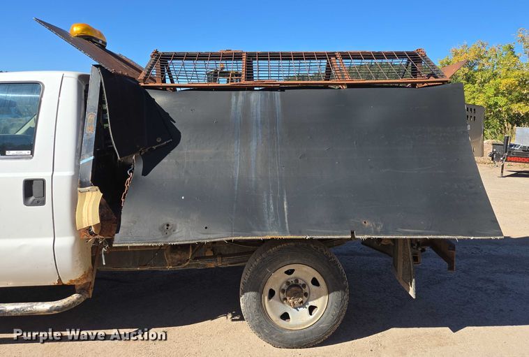 image for item DY1249 2009 Ford F350 Super Duty XL flatbed pickup truck