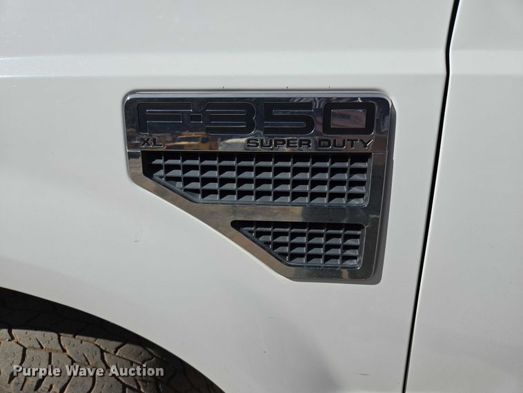 image for item DY1249 2009 Ford F350 Super Duty XL flatbed pickup truck