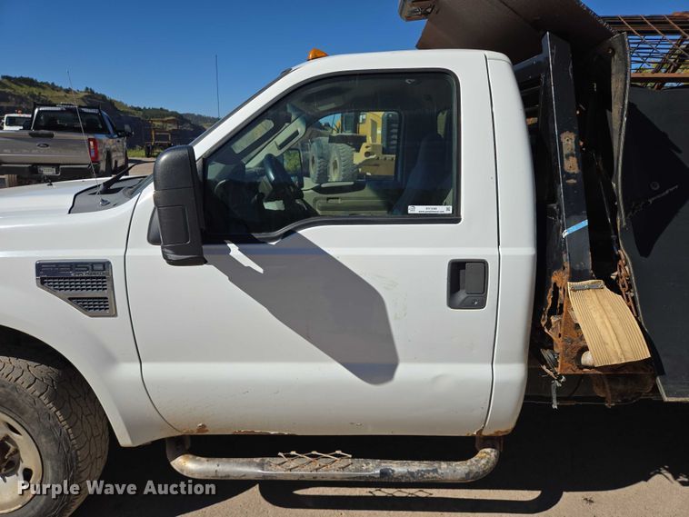 image for item DY1249 2009 Ford F350 Super Duty XL flatbed pickup truck