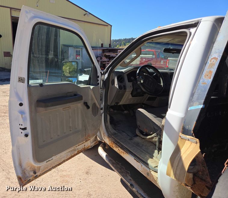 image for item DY1249 2009 Ford F350 Super Duty XL flatbed pickup truck