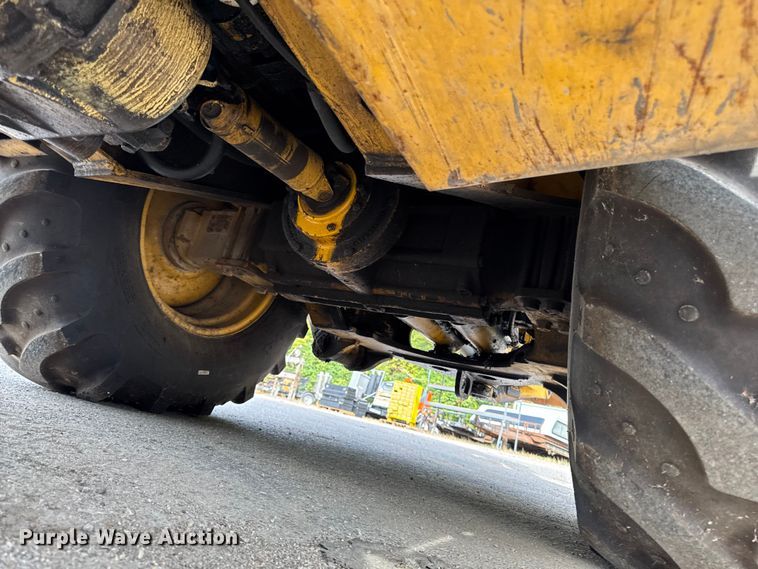 image for item EA1908 1999 John Deere 310SE backhoe