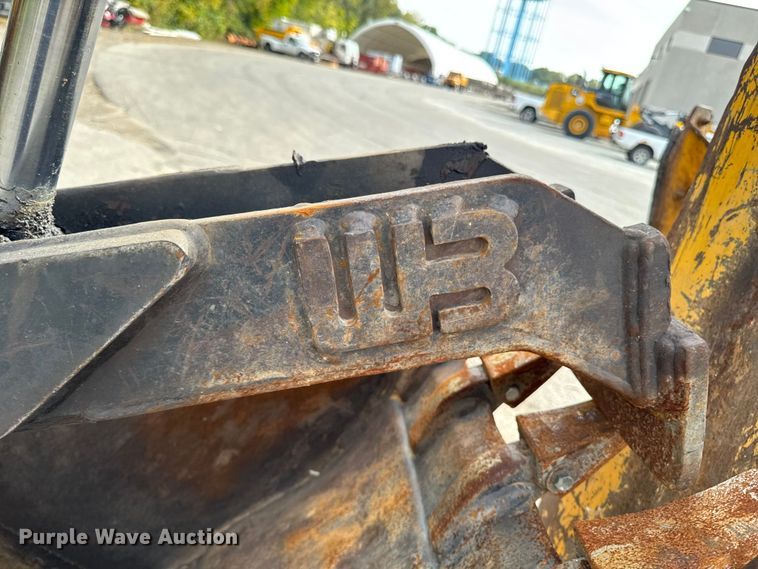 image for item EA1908 1999 John Deere 310SE backhoe