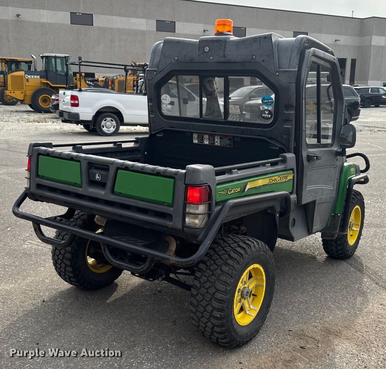 image for item EA1913 2015 John Deere 825I utility vehicle