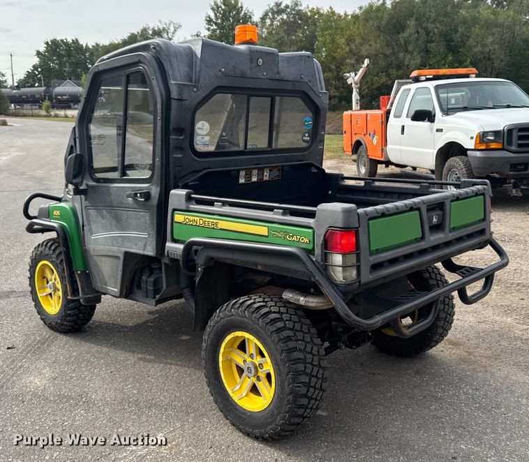 image for item EA1913 2015 John Deere 825I utility vehicle