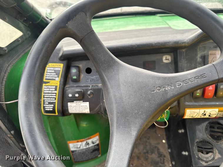 image for item EA1913 2015 John Deere 825I utility vehicle