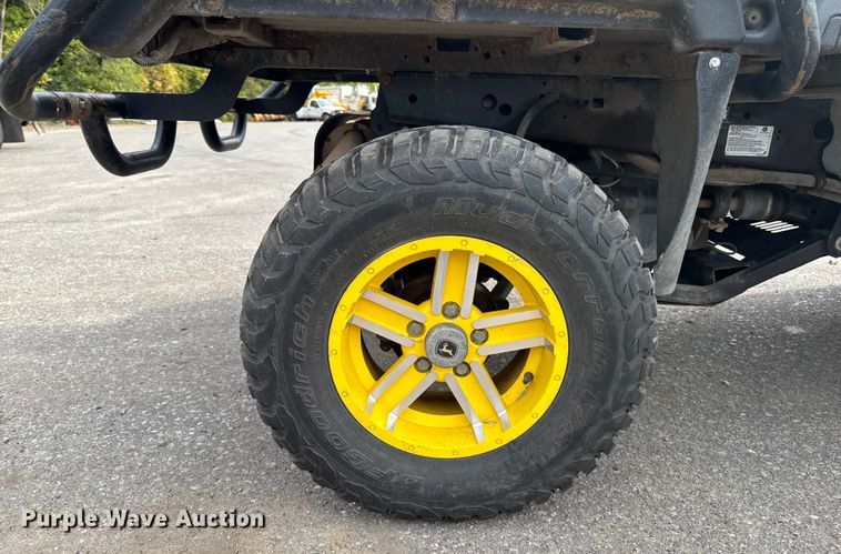 image for item EA1913 2015 John Deere 825I utility vehicle