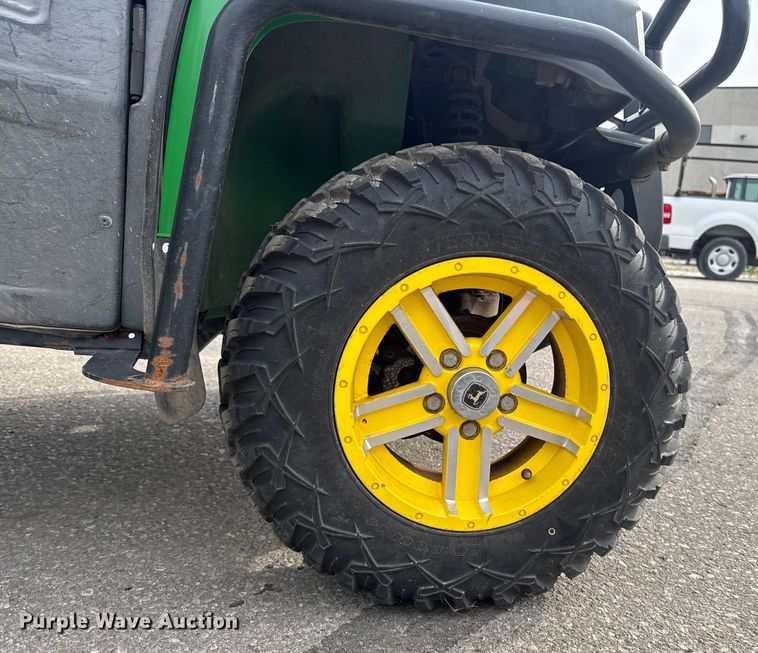 image for item EA1913 2015 John Deere 825I utility vehicle