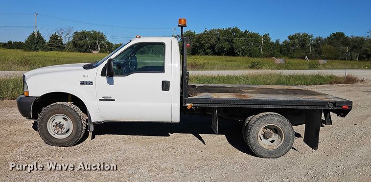 image for item EB8346 2002 Ford F350 Super Duty XL flatbed pickup truck