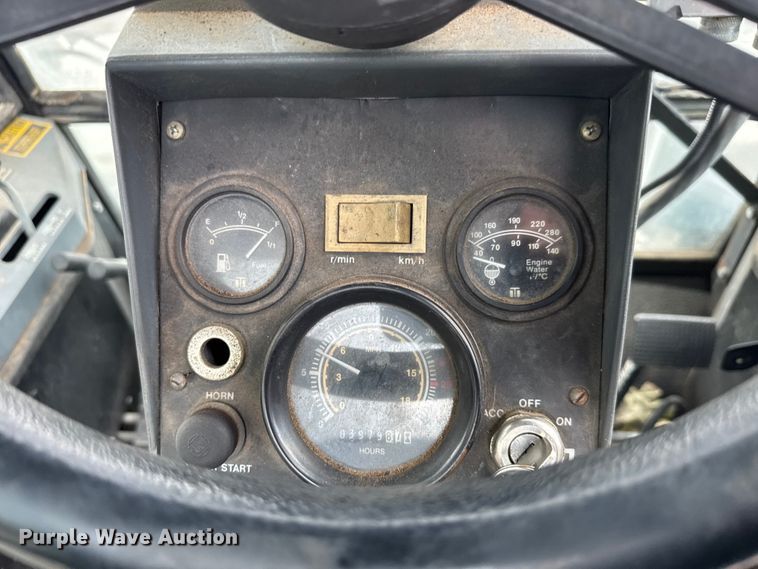 image for item EM8216 1998 New Holland 9030E bi-directional tractor