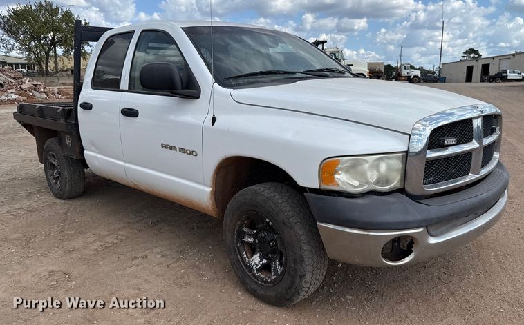 image for item EU5019 2002 Dodge Ram 1500 Quad Cab flatbed pickup truck