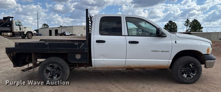 image for item EU5019 2002 Dodge Ram 1500 Quad Cab flatbed pickup truck