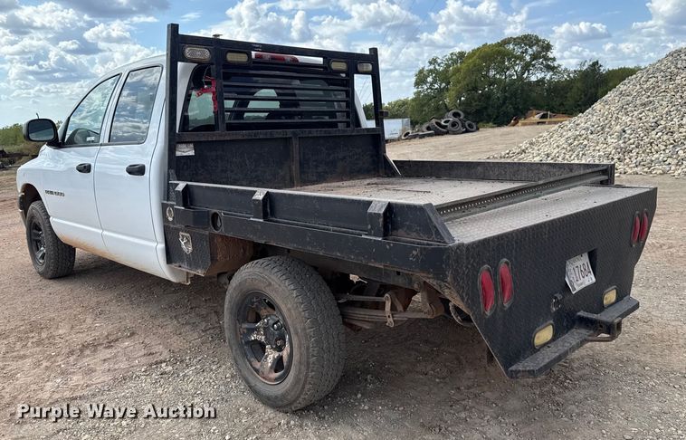 image for item EU5019 2002 Dodge Ram 1500 Quad Cab flatbed pickup truck