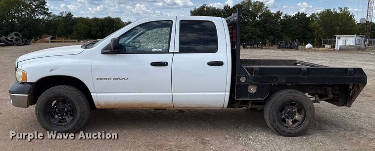 image for item EU5019 2002 Dodge Ram 1500 Quad Cab flatbed pickup truck