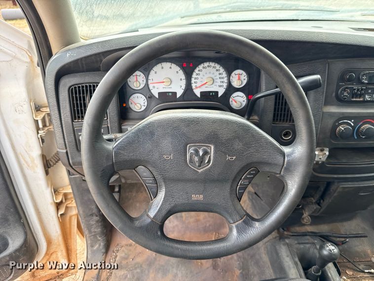 image for item EU5019 2002 Dodge Ram 1500 Quad Cab flatbed pickup truck