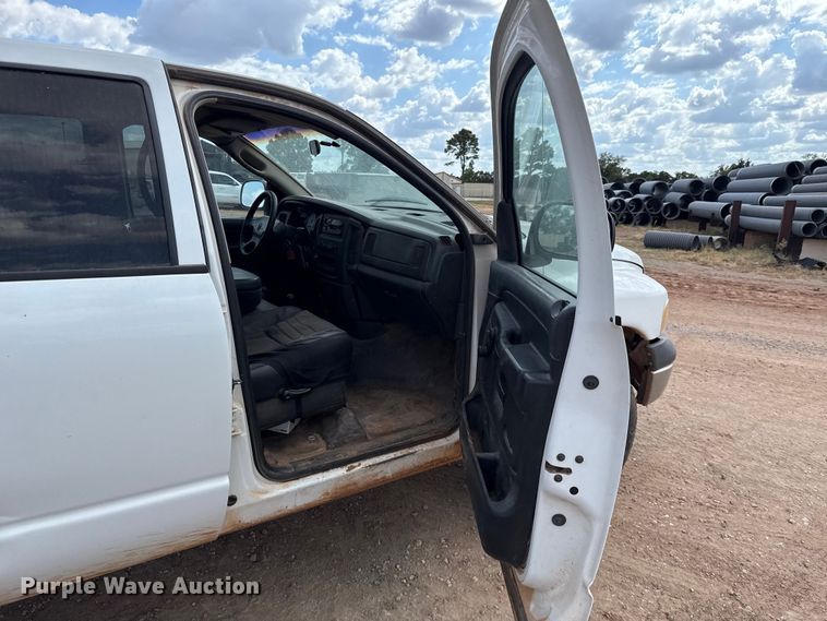 image for item EU5019 2002 Dodge Ram 1500 Quad Cab flatbed pickup truck