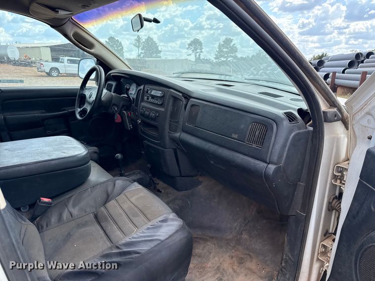 image for item EU5019 2002 Dodge Ram 1500 Quad Cab flatbed pickup truck