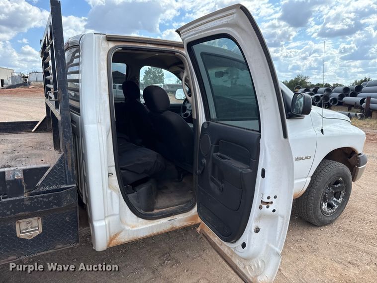 image for item EU5019 2002 Dodge Ram 1500 Quad Cab flatbed pickup truck