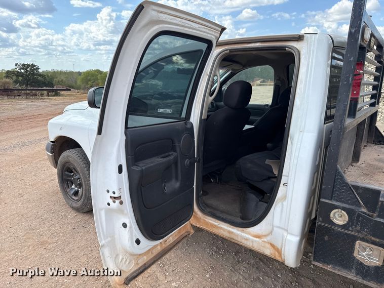image for item EU5019 2002 Dodge Ram 1500 Quad Cab flatbed pickup truck