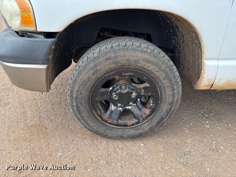 image for item EU5019 2002 Dodge Ram 1500 Quad Cab flatbed pickup truck