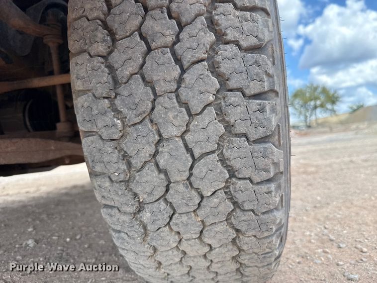 image for item EU5019 2002 Dodge Ram 1500 Quad Cab flatbed pickup truck