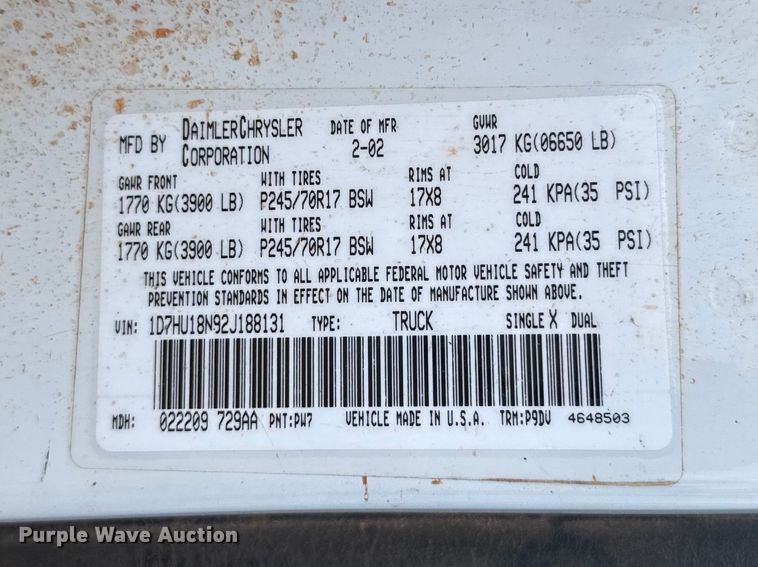 image for item EU5019 2002 Dodge Ram 1500 Quad Cab flatbed pickup truck