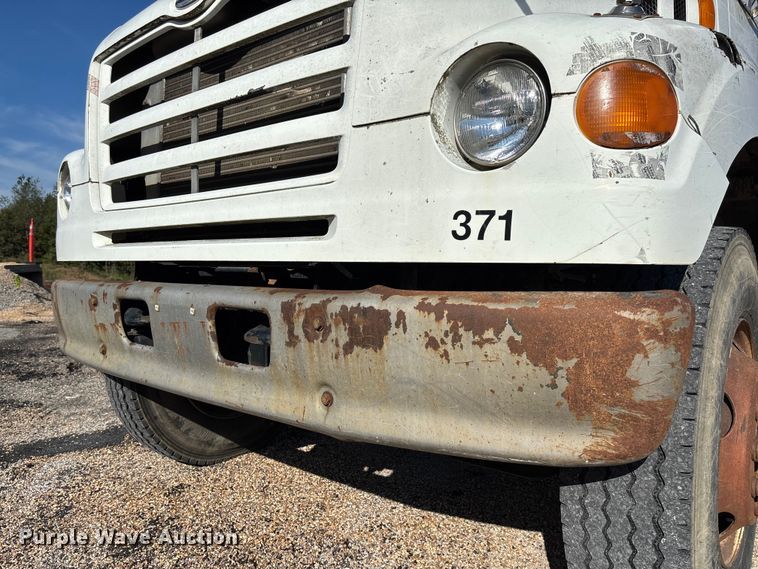 image for item EV3033 2000 Sterling LT7501 grapple truck