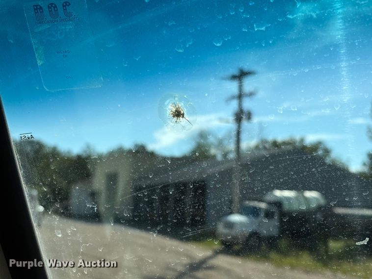 image for item EV3033 2000 Sterling LT7501 grapple truck