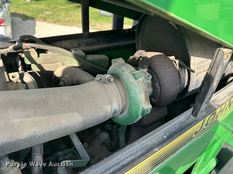 image for item DV0643 1996 John Deere 7400 MFWD tractor