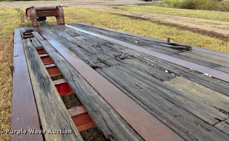 image for item ER2459 1997 Nuttall lowboy oilfield trailer