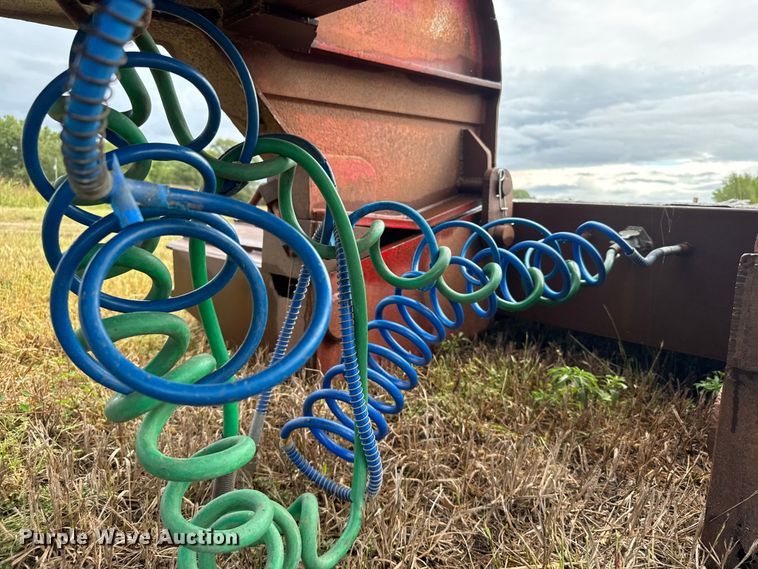 image for item ER2459 1997 Nuttall lowboy oilfield trailer