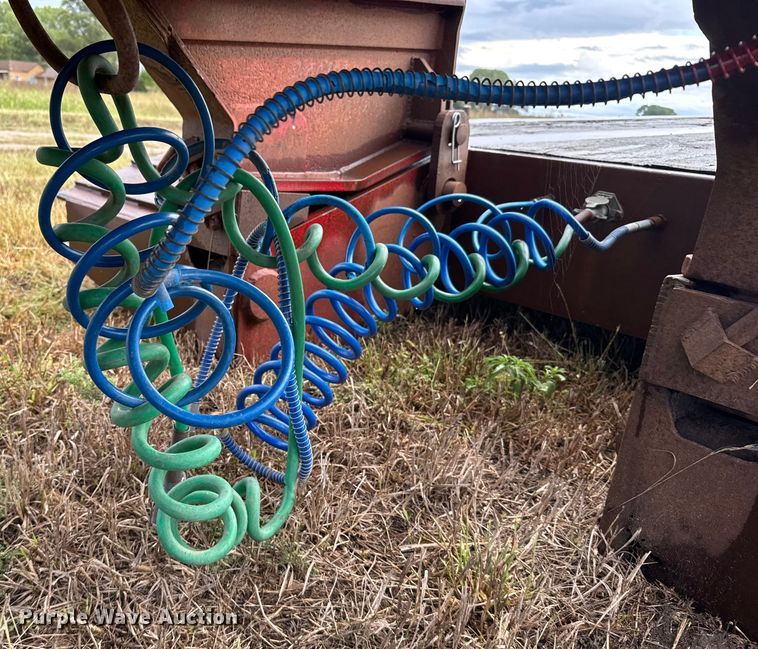 image for item ER2459 1997 Nuttall lowboy oilfield trailer