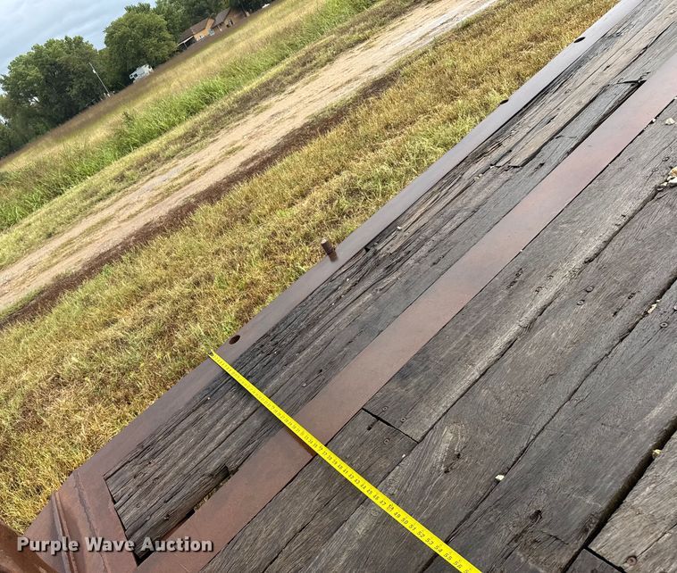 image for item ER2459 1997 Nuttall lowboy oilfield trailer