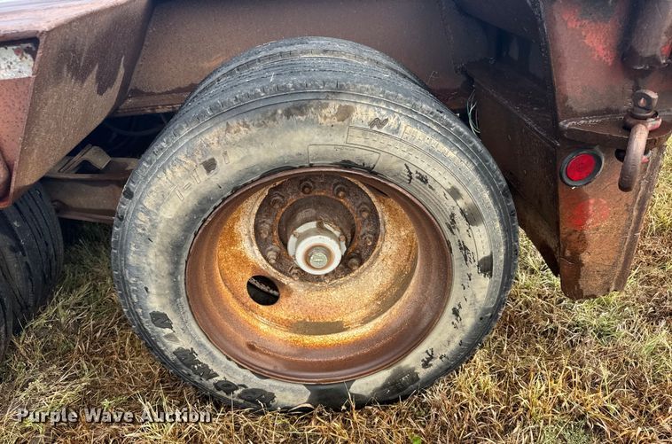 image for item ER2459 1997 Nuttall lowboy oilfield trailer