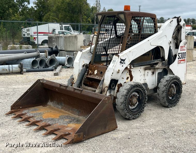 MINI CARGADOR SOBRE RUEDAS 2008 BOBCAT S300