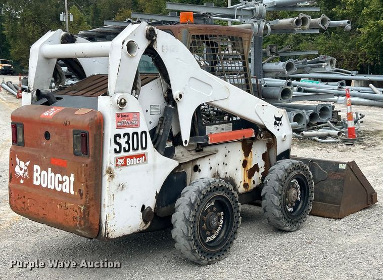 MINI CARGADOR SOBRE RUEDAS 2008 BOBCAT S300