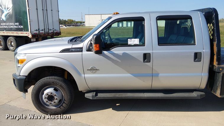 image for item DU3593 2014 Ford F350 Super Duty flatbed pickup truck