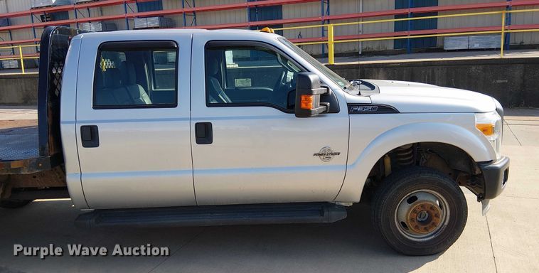 image for item DU3593 2014 Ford F350 Super Duty flatbed pickup truck