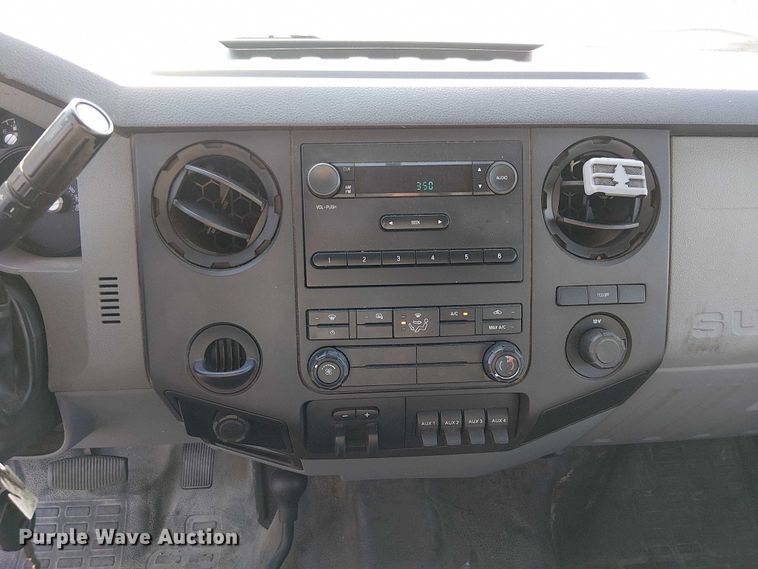 image for item DU3593 2014 Ford F350 Super Duty flatbed pickup truck