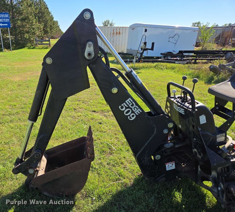 image for item DY1317 Edge 509 skid steer backhoe