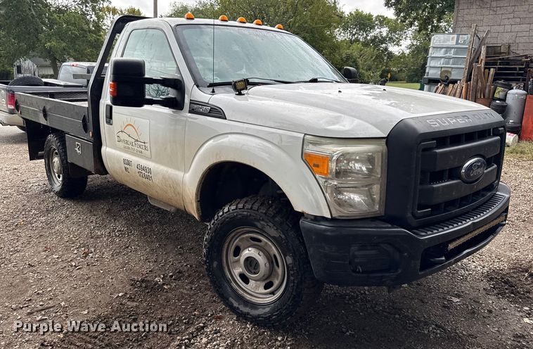 image for item DY8205 2013 Ford F250 Super Duty flatbed pickup truck